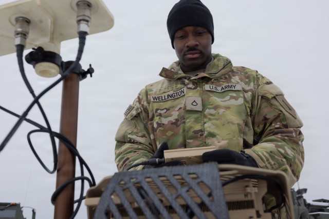 Army Pfc. Tyrese Williams, assigned to the 3rd Squadron, 2nd Cavalry Regiment, prepares an electronic countermeasure platform for a static display during Operation Winter Falcon 26 at the Drawsko Combat Training Center in Oleszno, Poland, Jan. 13,...
