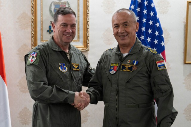 U.S. Air Force Maj. Gen. Gary Keefe, the Adjutant General of the Massachusetts National Guard (MANG), left, awards Paraguayan Air Force Commander Gen. Julio Rubén Fullaondo Céspedes with the Medal of Merit in Asunción, Paraguay, Jan. 21, 2026....