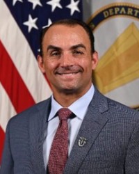 Mr. Christopher M. Sims