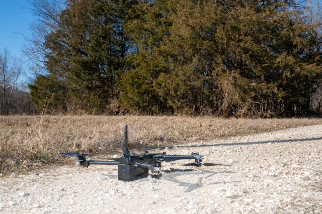 Soldiers with 2nd Platoon, Company C, 35th Engineer Battalion maintain their concealed position inside vegetation at Fort Leonard Wood after notionally shooting down an unmanned aircraft system while being tested on their abilities to react to an...