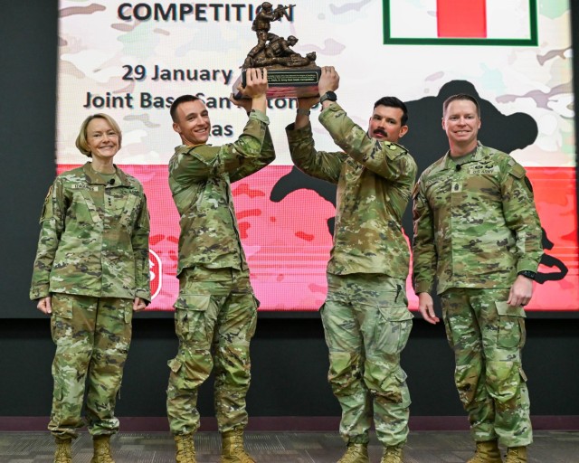 Lt. Gen. Mary K. Izaguirre, Army surgeon general and commander of U.S. Army Medical Command and Command Sgt. Maj. John E. Dobbins, command sergeant major of U.S. Army Medical Command, present the winners of the 2026 Best Medic Competition.