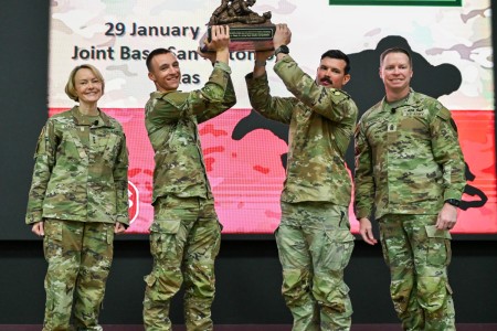 Lt. Gen. Mary K. Izaguirre, Army surgeon general and commander of U.S. Army Medical Command and Command Sgt. Maj. John E. Dobbins, command sergeant major of U.S. Army Medical Command, present the winners of the 2026 Best Medic Competition.