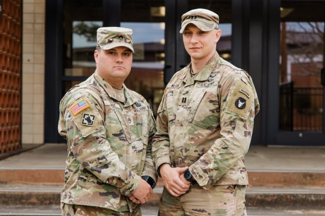 Staff Sgt. Nick Cruz and Capt. Grant Wilson, Fort Rucker Soldiers, pose together after working as a team to help locate an Enterprise missing child on Jan. 27, 2026.