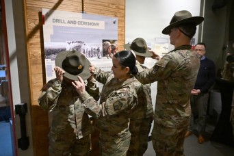 When the brown round campaign hat became the standardized headgear for all Army drill sergeants it was an end of an era and the merger of one standard.