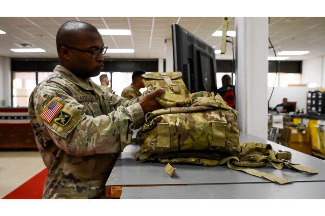 A Soldier from the 513th Military Intelligence Brigade turns in his Organizational Clothing and Individual Equipment in March 2025 at the Central Issue Facility at Fort Gordon, Georgia.