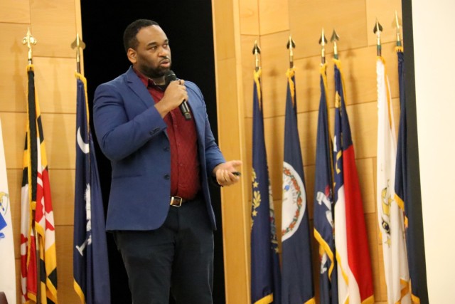 Frank Frisby of CECOM ASIC presents AI FLOW at APG Innovation Showcase in Myer Auditorium on January 20, 2026.