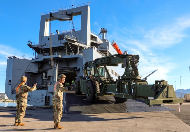 U.S. Army Soldiers with the 8th Military Police Brigade and 8th Theater Sustainment Command download a rough terrain container handler from the U.S. Naval Ship Watson at Joint Base Pearl Harbor-Hickam, Hawaii, Nov. 29, 2022. This Army...