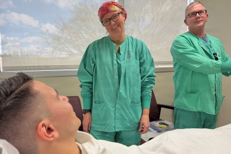Maj. Laura Payton, chief of Anesthesia and Surgical Services at Bayne-Jones Army Community Hospital, speaks with Spc. Jose David, an orthopedic specialist assigned to BJACH, during a demonstration Jan. 2026 at Fort Polk, Louisiana, as Lt. Col....