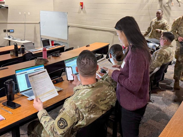 Ms. Lily Zhang, Deloitte Accessions Information Environment product lead, coaches U.S. Army Recruiters on AIE system processes during a Screening Capability Development Event in Indianapolis, Indiana, Jan. 29, 2026. Developers worked side-by-side...