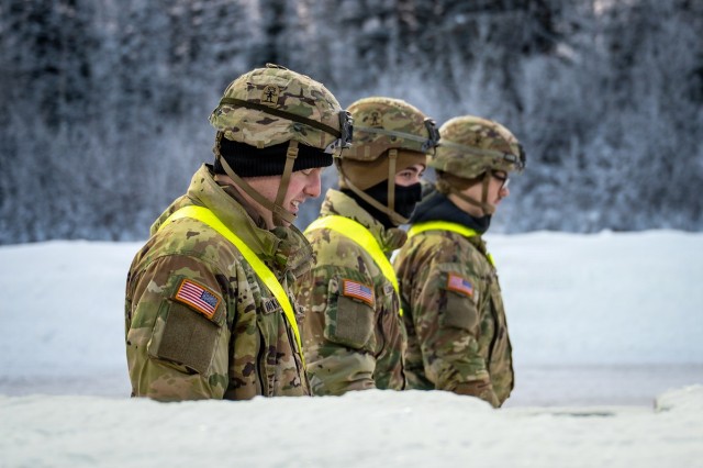 Soldiers load freight in preparation for JPMRC 26-02