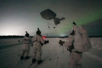 Paratroopers with 11th Airborne Division jump as OPFOR during Joint Pacific Multinational Readiness Center rotation