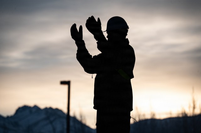 Soldiers load freight in preparation for JPMRC 26-02