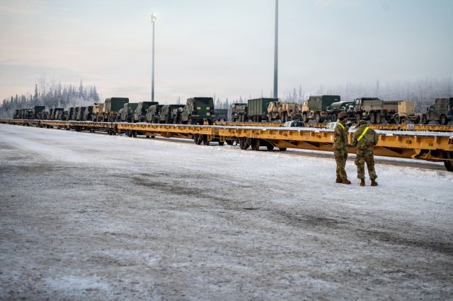 Soldiers load freight in preparation for JPMRC 26-02
