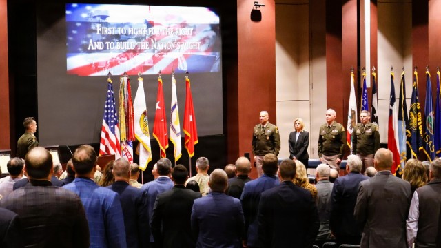 Ceremony overview with audience and leadership on stage