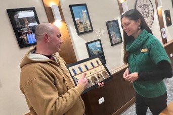 “Artist of the Month” is back with a photo exhibit at new location