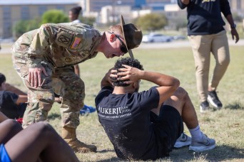 Students, coaches experience Army discipline, teamwork during U.S. Army Experience at Fort Hood