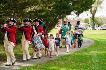 Children marching in the annual Pinwheel Parade