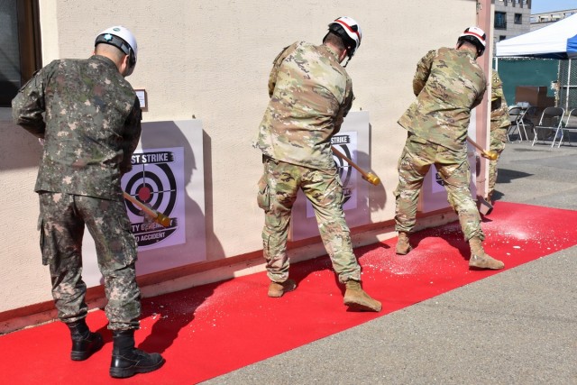 Sledgehammer swings mark start of Camp Walker emergency services project