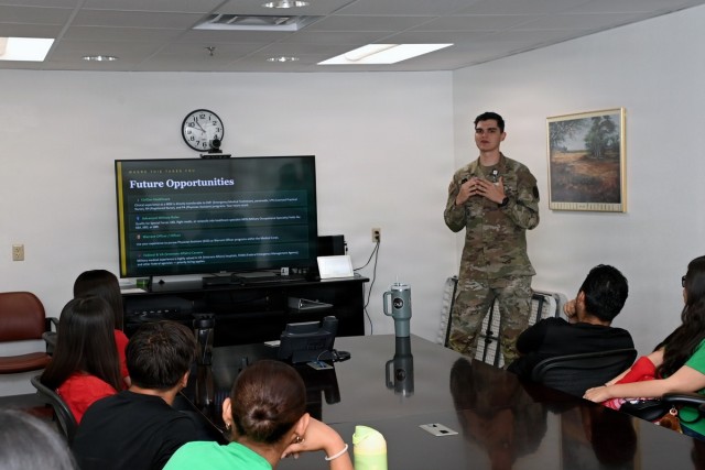Pfc. Nicholas Venus of the U.S. Army Yuma Proving Ground Health Clinic briefs a group of about 30 young people made up of both Army recruits under contract and members of San Luis High School’s Emergency Medical Services class at the clinic on...