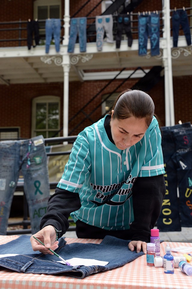 Fort Leavenworth SHARP community holds jeans-painting party to support Sexual Assault Awareness and Prevention Month.