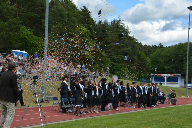 Mortarboards, away!