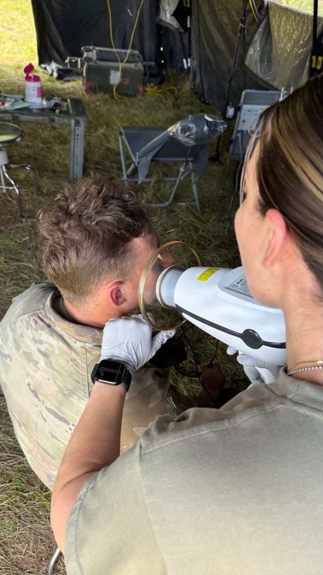 Dogface Soldiers conduct dental exams in the field