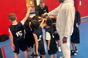 Preventive Medicine Soldier Mentors the Next Generation on the Court