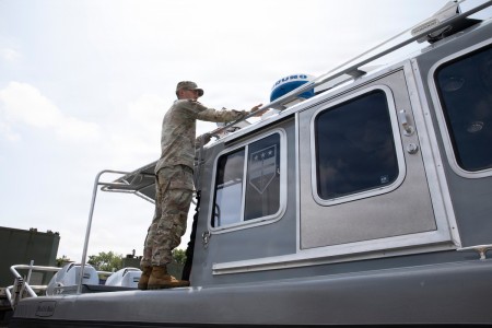 JTF-DC Guardsman inspects Special Purpose Brigade Boat