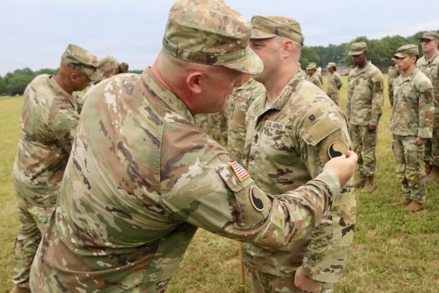 Soldiers swap out patches, guidons as 529th CSSB transitions to 529th DSSB